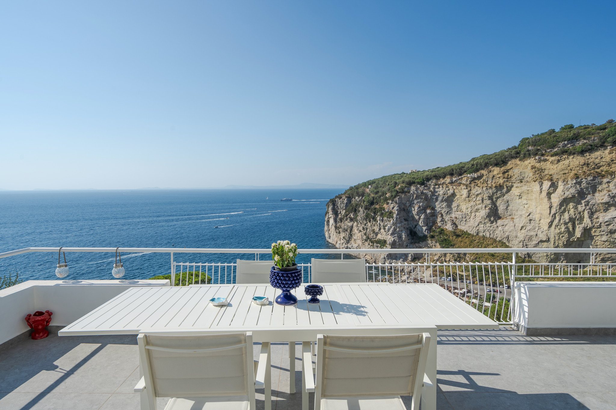 Terrace detail with the Mediterranean beyond