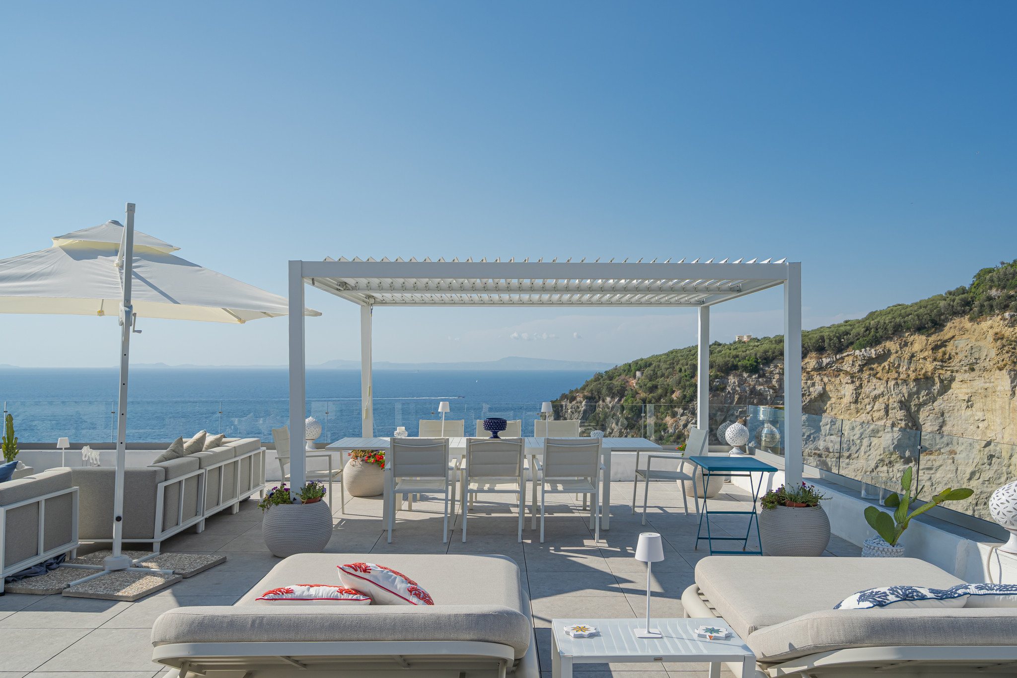 The pergola and solarium beside the pool